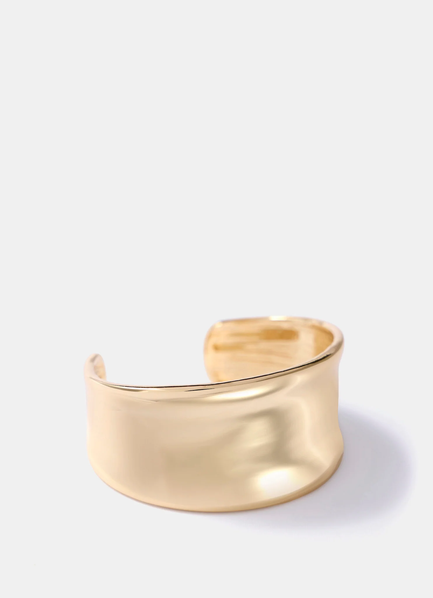 11586-gold-tone-cuff-bracelet-1.webp Gold Tone Cuff Bracelet