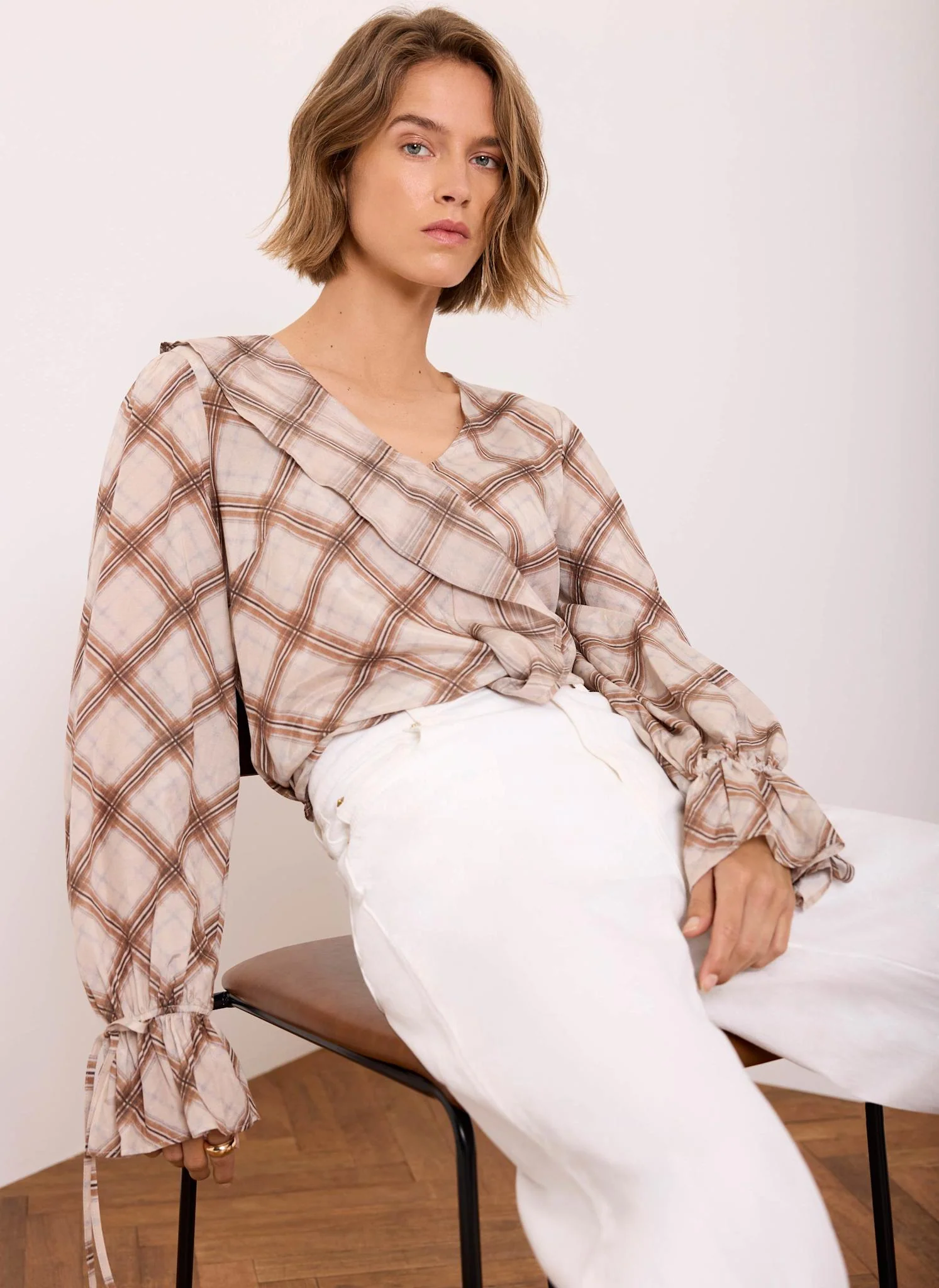 275-neutral-checked-print-ruffle-blouse-1.webp Neutral Checked Print Ruffle Blouse