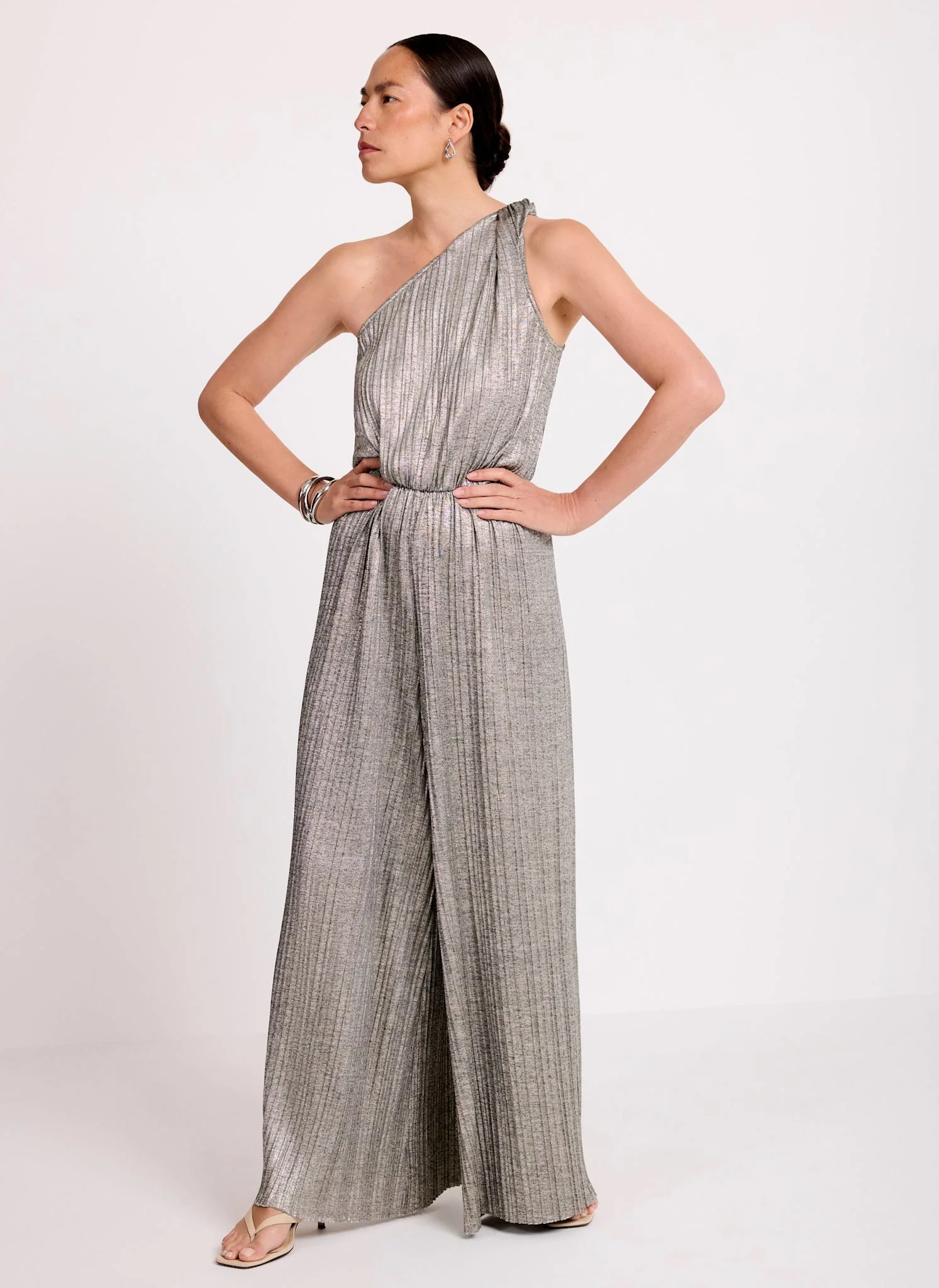 323-metallic-plisse-one-shoulder-jumpsuit-4.webp Metallic Plisse One Shoulder Jumpsuit