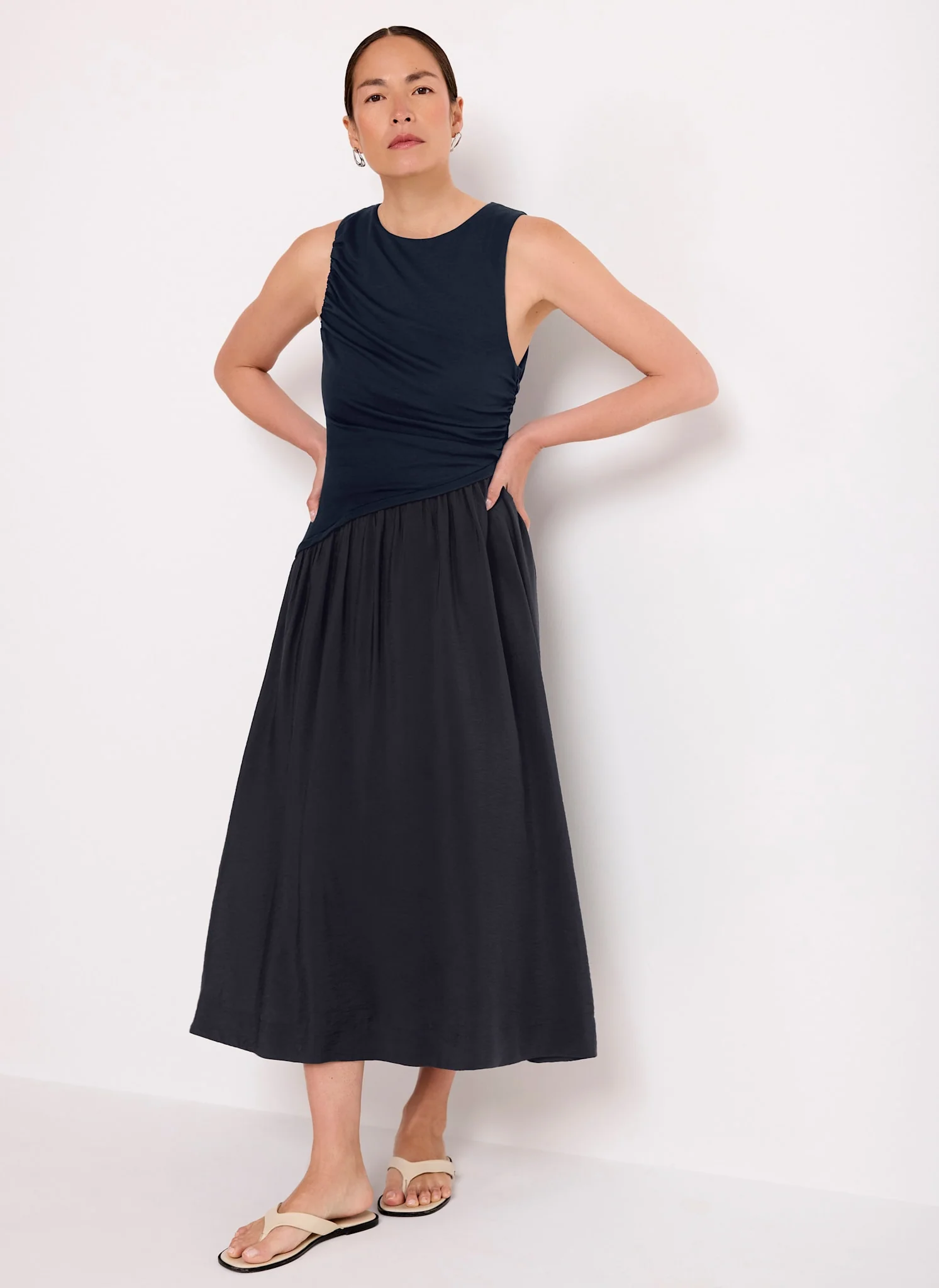 451-navy-asymmetric-waist-midi-dress-1.webp Navy Asymmetric Waist Midi Dress