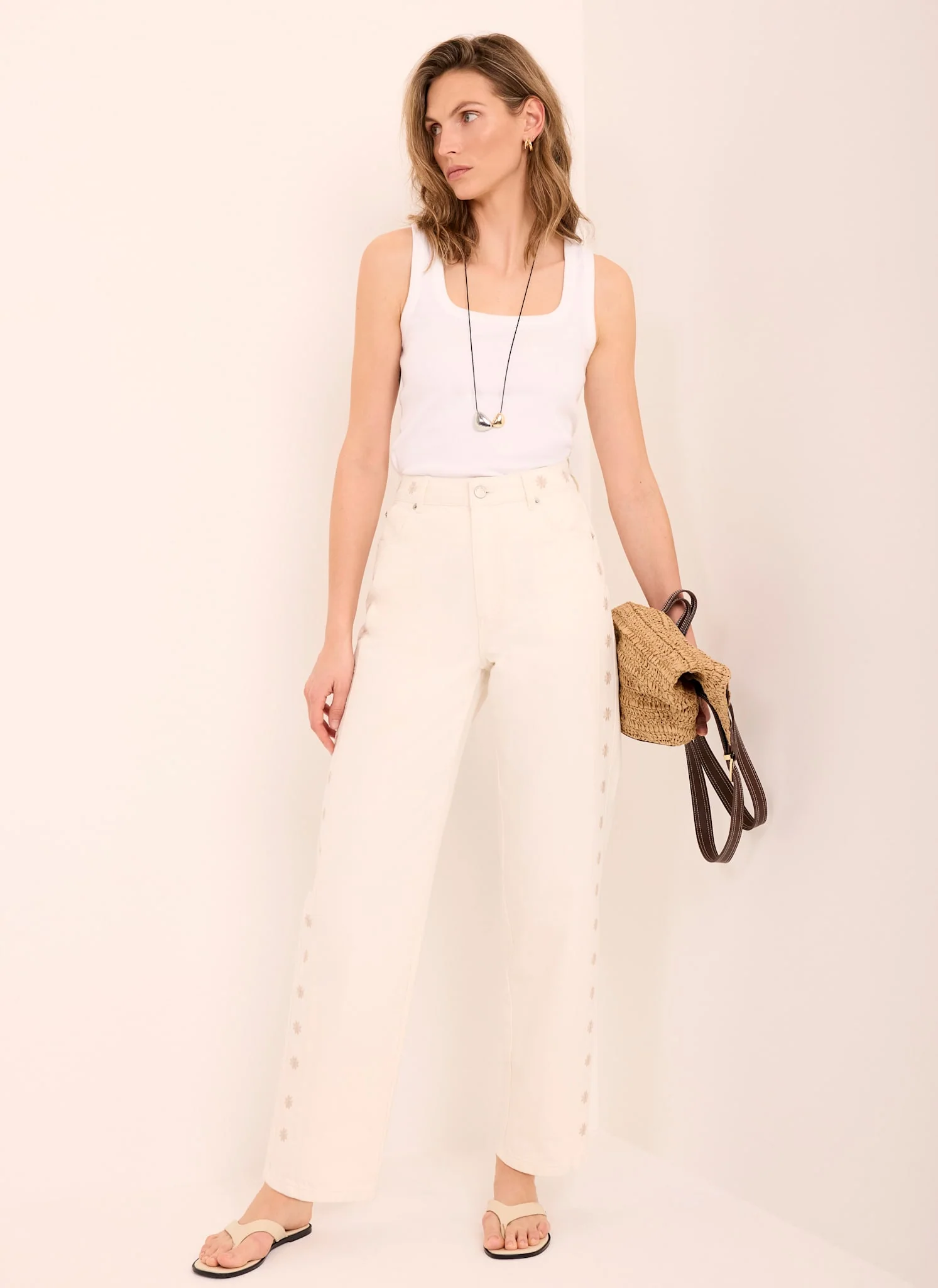 4510-cream-floral-embroidered-tapered-jeans-4.webp Cream Floral Embroidered Tapered Jeans