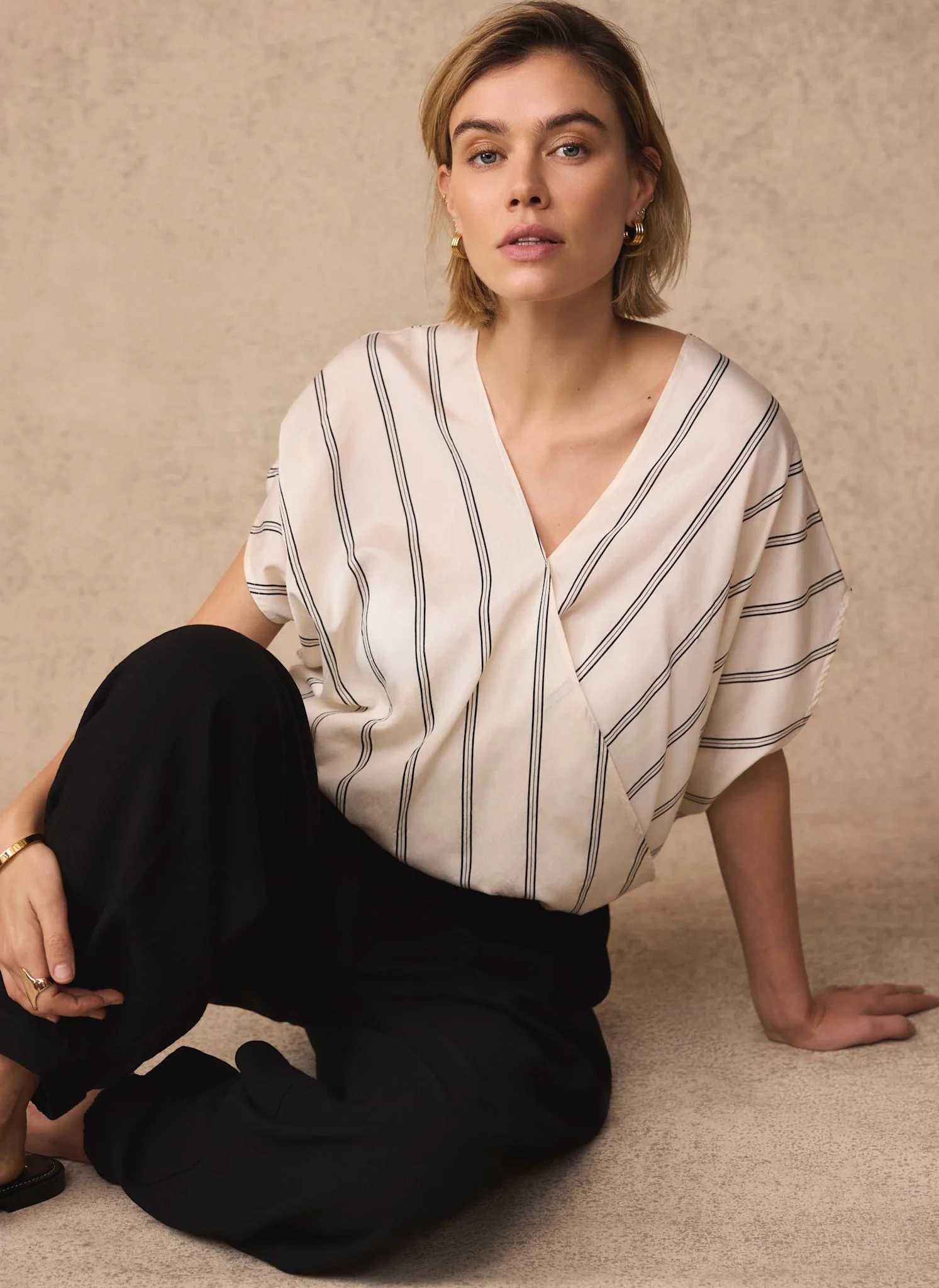 5546-neutral-pinstriped-wrap-blouse-1.webp Neutral Pinstriped Wrap Blouse