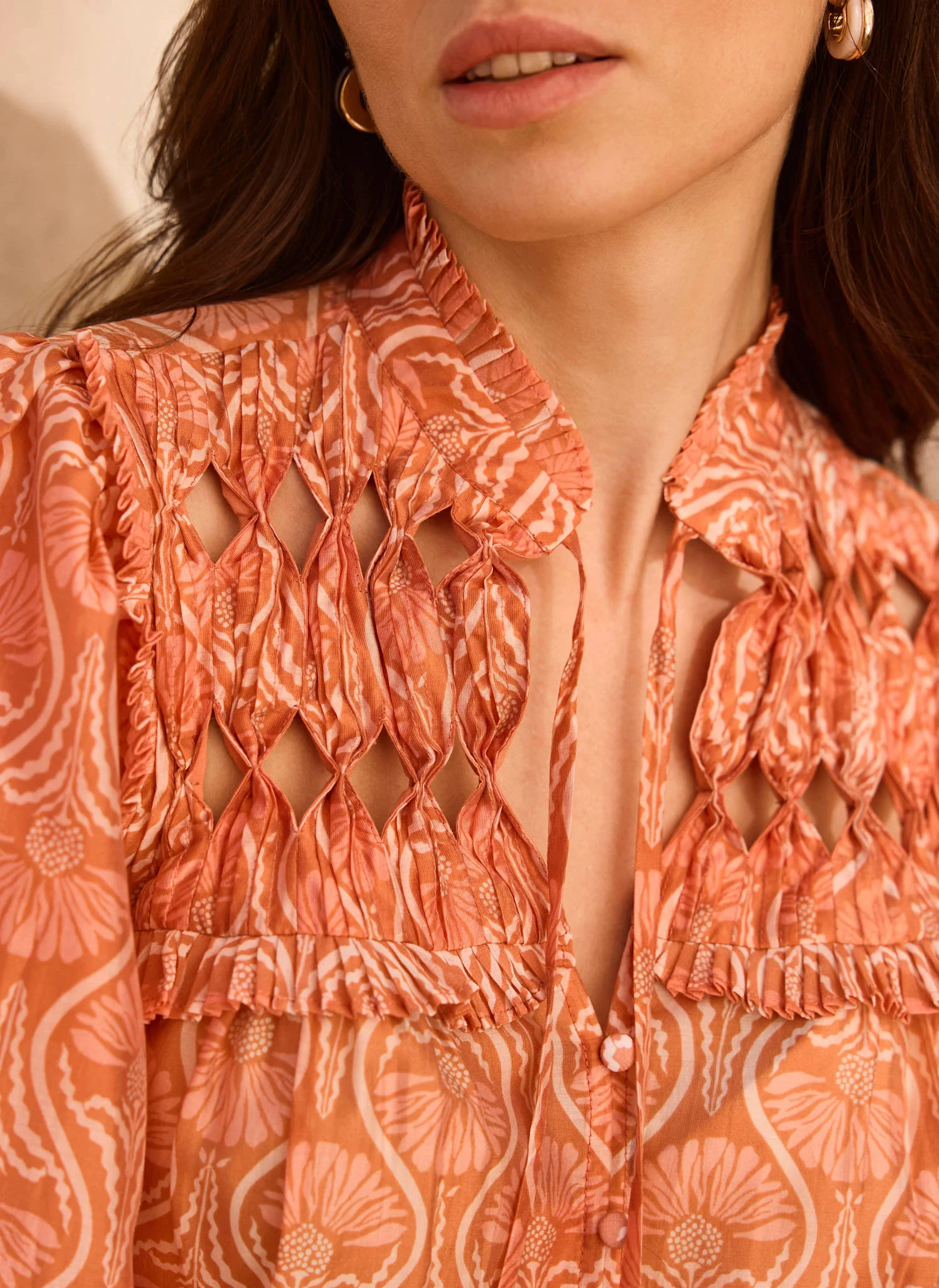 834-orange-printed-cut-out-tie-blouse-4.webp Orange Printed Cut Out Tie Blouse