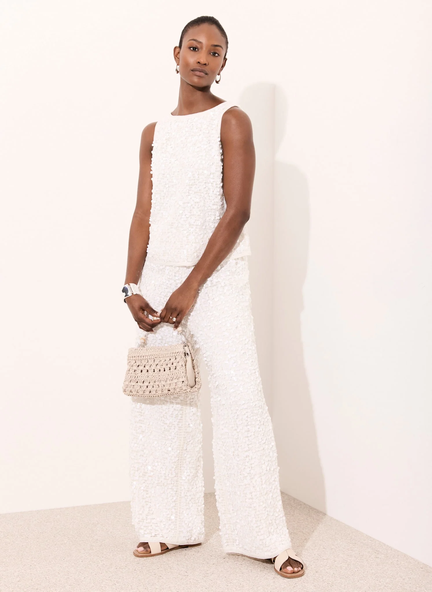 8696-white-sequin-sleeveless-top-5.webp White Sequin Sleeveless Top