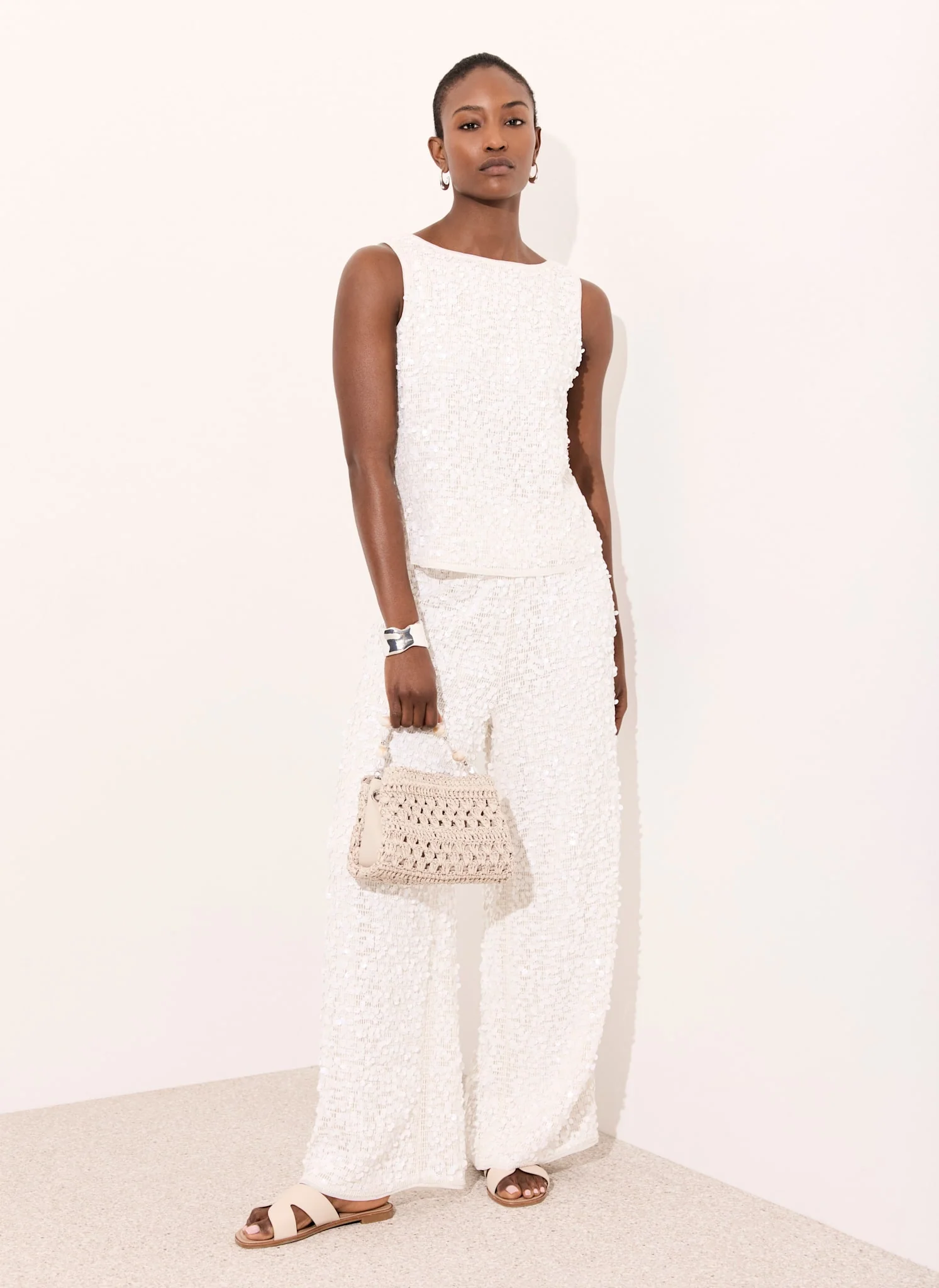 8696-white-sequin-sleeveless-top-6.webp White Sequin Sleeveless Top