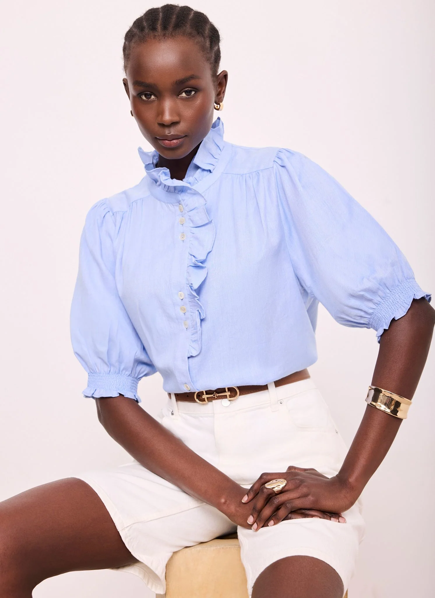 904-blue-cotton-chambray-ruffle-blouse-1.webp Blue Cotton Chambray Ruffle Blouse